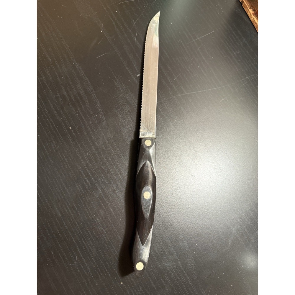 Cutco 1729  petite carver knife serrated 6 1/2 inch blade Brown Swirl handle